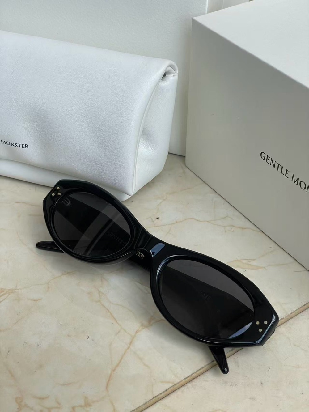Gentle Monster Black Oval Sunglasses - Sleek Women’s Accessory